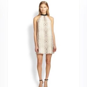 Haute Hippi Sleeveless snakeskin
Choker Mini Dress. Fully lined size small .